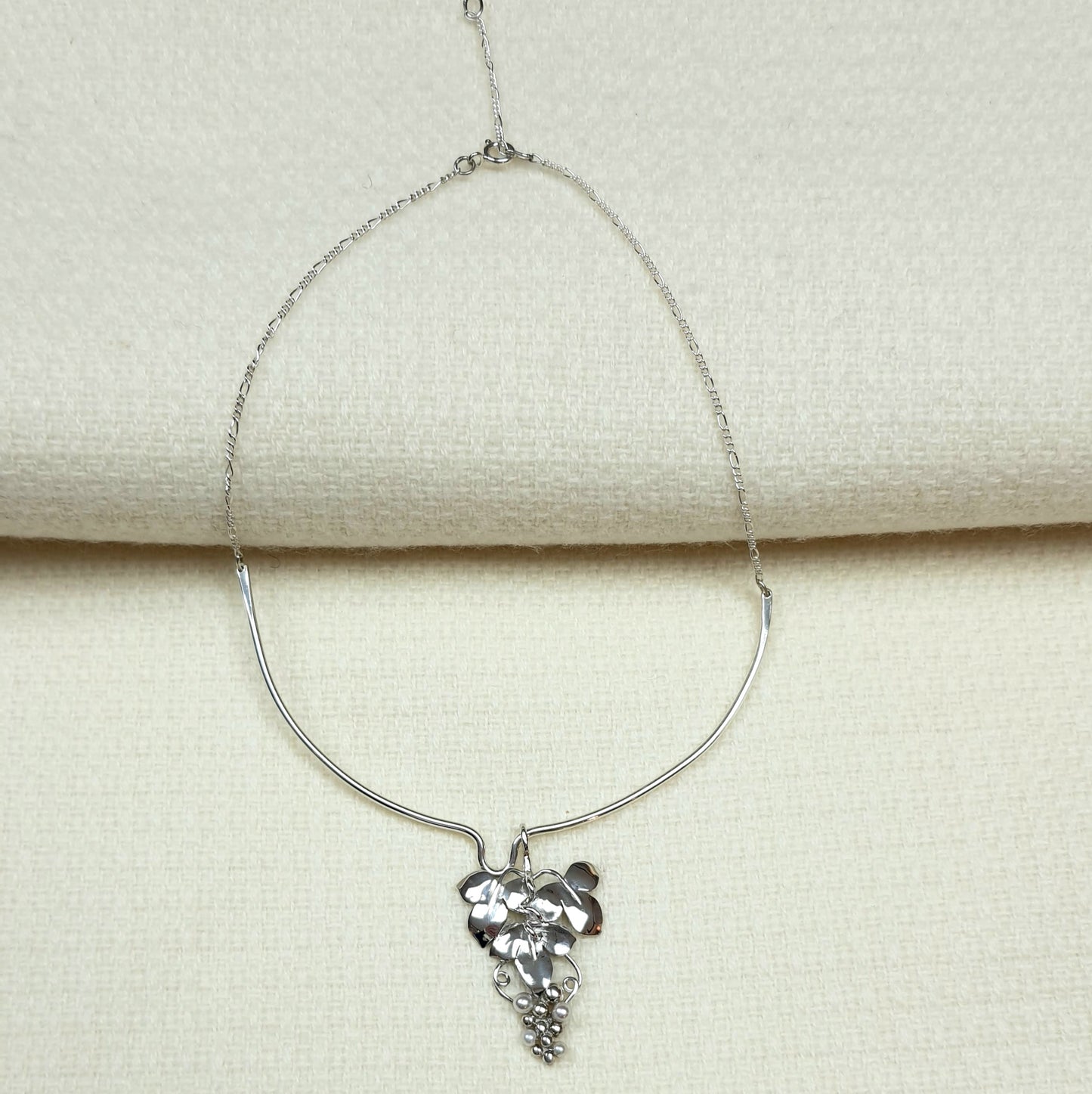 Silver Pendant with a bunch of Grapes on the Vine, in Silver and Seed Pearls.